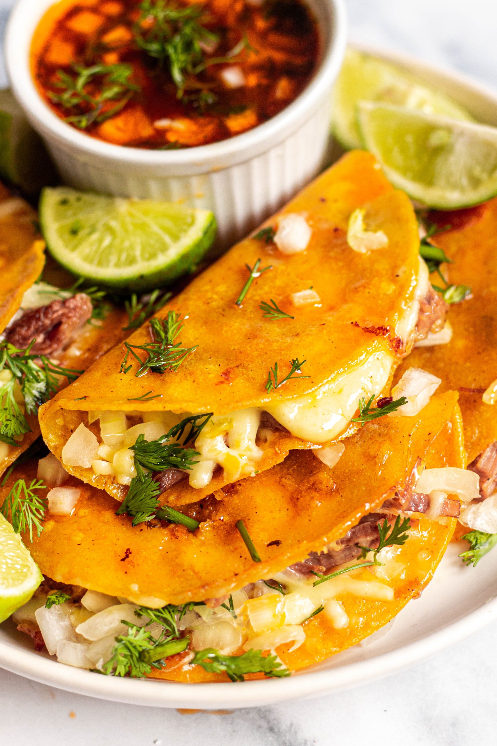 cheesy birria tacos
